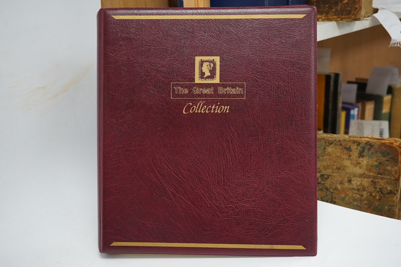 A collection of stamp albums, unmounted stamps and empty stock sheets, including a Victorian stamp album edited by Richard Senf, containing a selection of mid 19th century stamps, including an incomplete run of plated pe